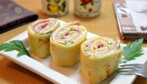 Блинные рулетики с начинкой из ветчины и сыра. Блинные рулетики с начинкой из ветчины и сыра.
