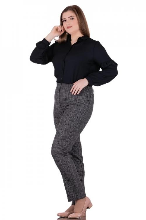 Стильно и уютно: как носить платье поверх брюк 18